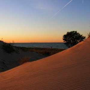 This is a photo of Lake Michigan as seen from the sand dunes in North West Indiana. If you look closely on the horizon you can see the outline of the 
