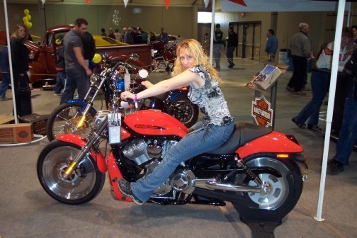 Me at the local car show, bugging my buddy who owns a harley dealership that he should give me this bike.