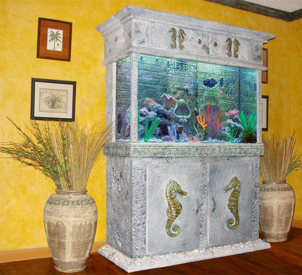 This is a 110 gal.Seahorse Aquarium with a Three Dimensional Background inside the tank. Sea life can interact with the background. All pipes and pump
