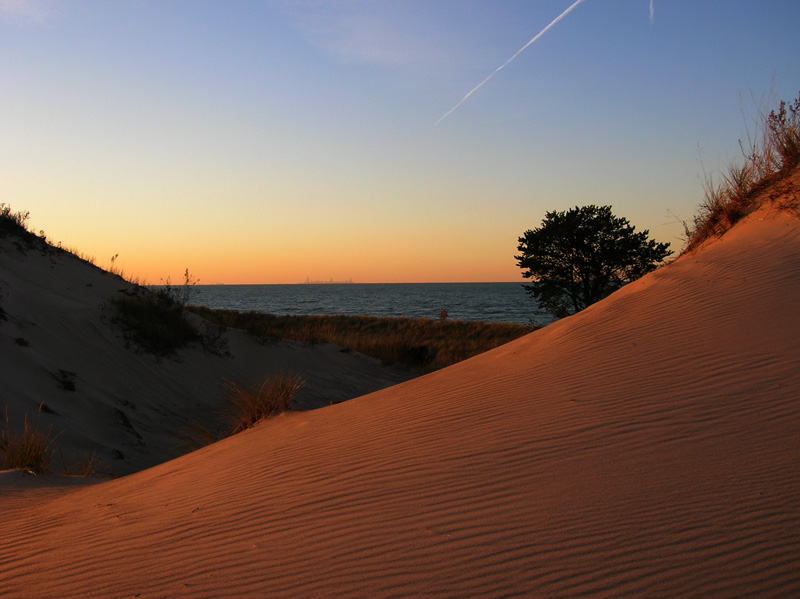 This is a photo of Lake Michigan as seen from the sand dunes in North West Indiana. If you look closely on the horizon you can see the outline of the 