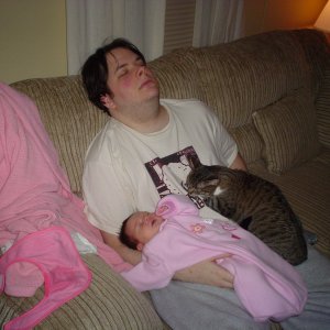 picture of me (my name is nick), my baby daughter chloe, and 'our other baby', elizabeth (cat 4 of 4)
chloe was born 12/04/04 @ 10:16pm
8 lbs 14 oz
el