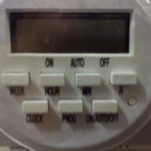 Dual outlet timer used to turn pumps on for one minute a day.